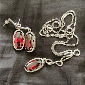 Silver necklace with red stone